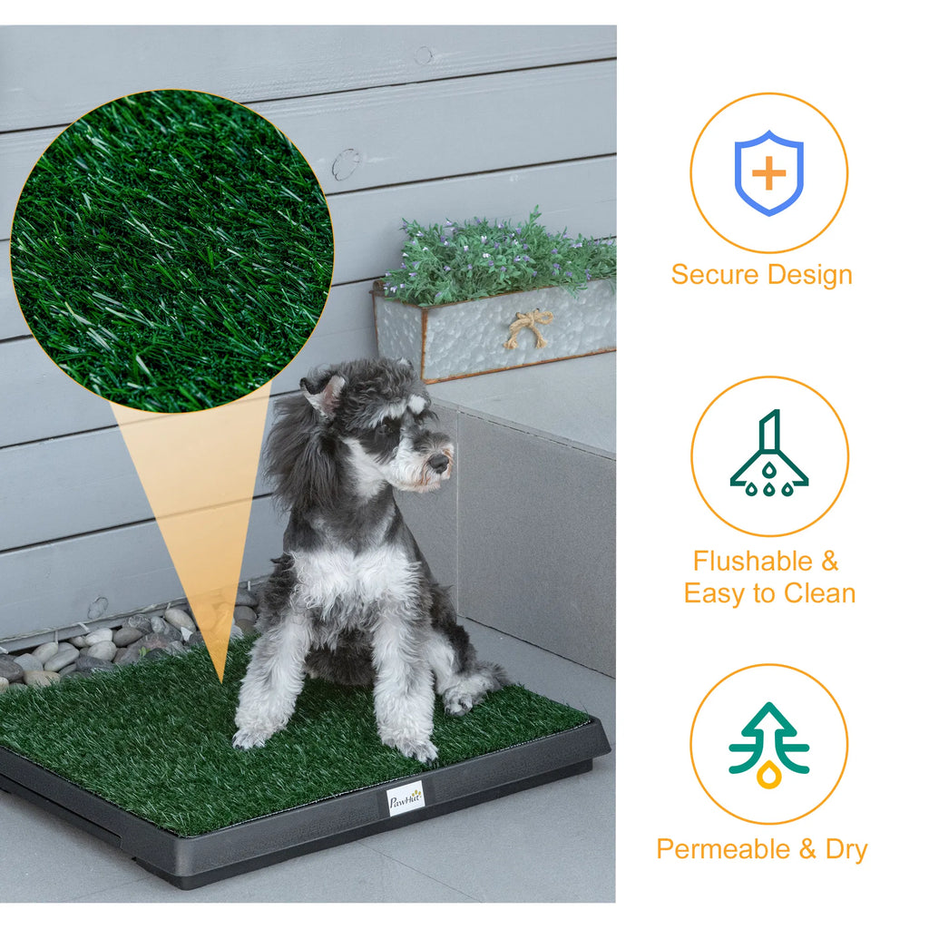 Dog using the grass potty pad